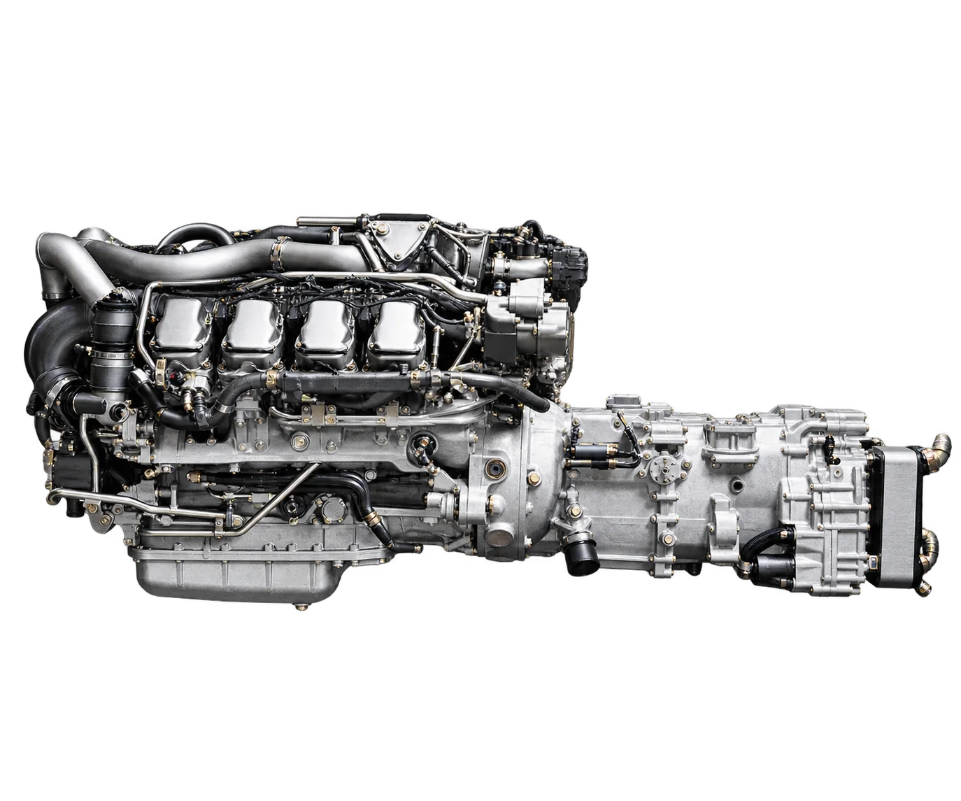 Un moteur diesel V8 avec sa boîte de vitesses, présenté seul en suspension devant un fond gris uni.